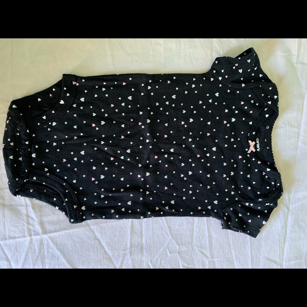 Black, pink, and white one piece. Carter’s 6months